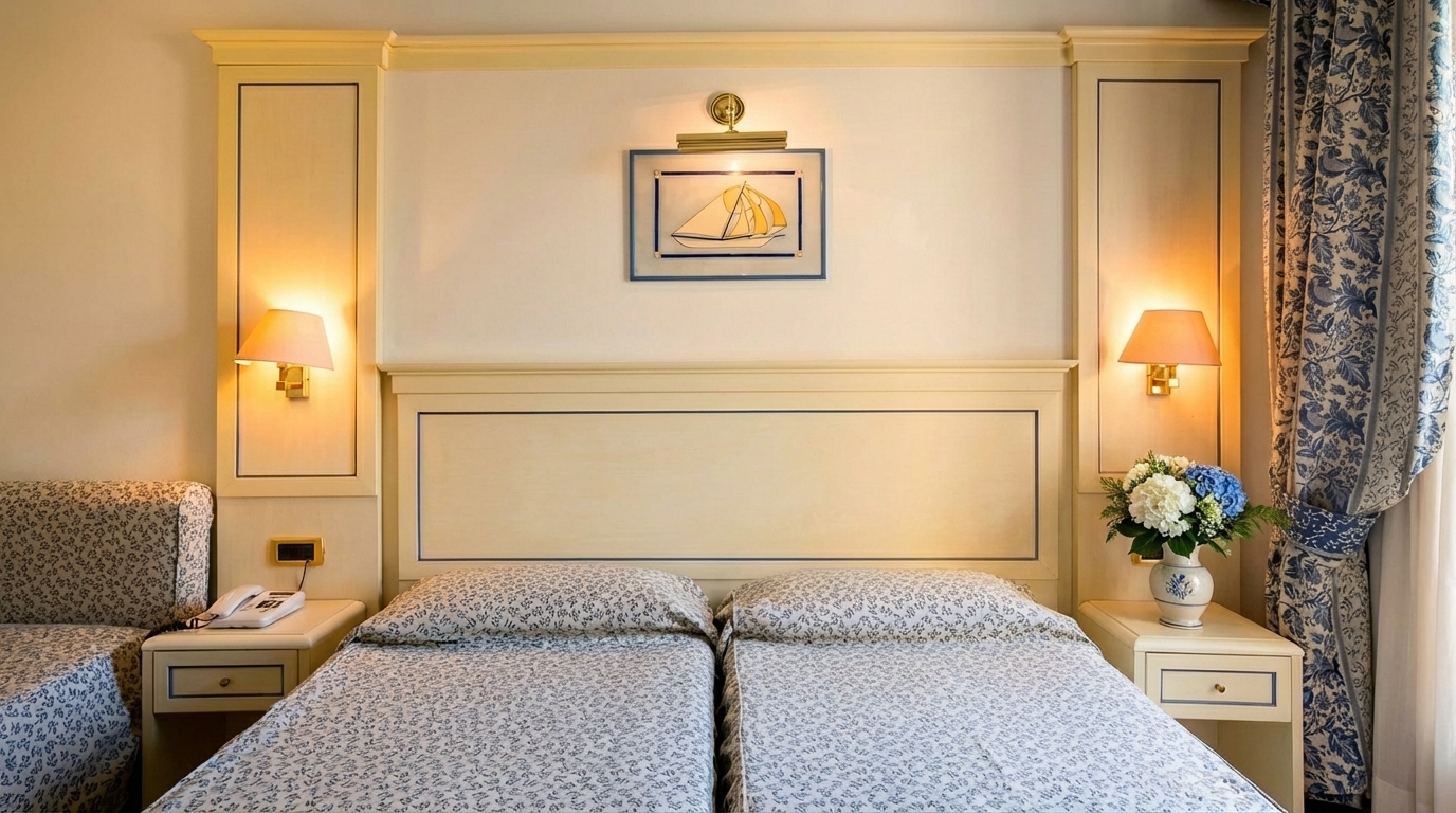 Bright and modern double room with clean white linens.